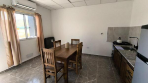 Depto en planta baja muy comodo hasta 4 personas con Aire acondicionado